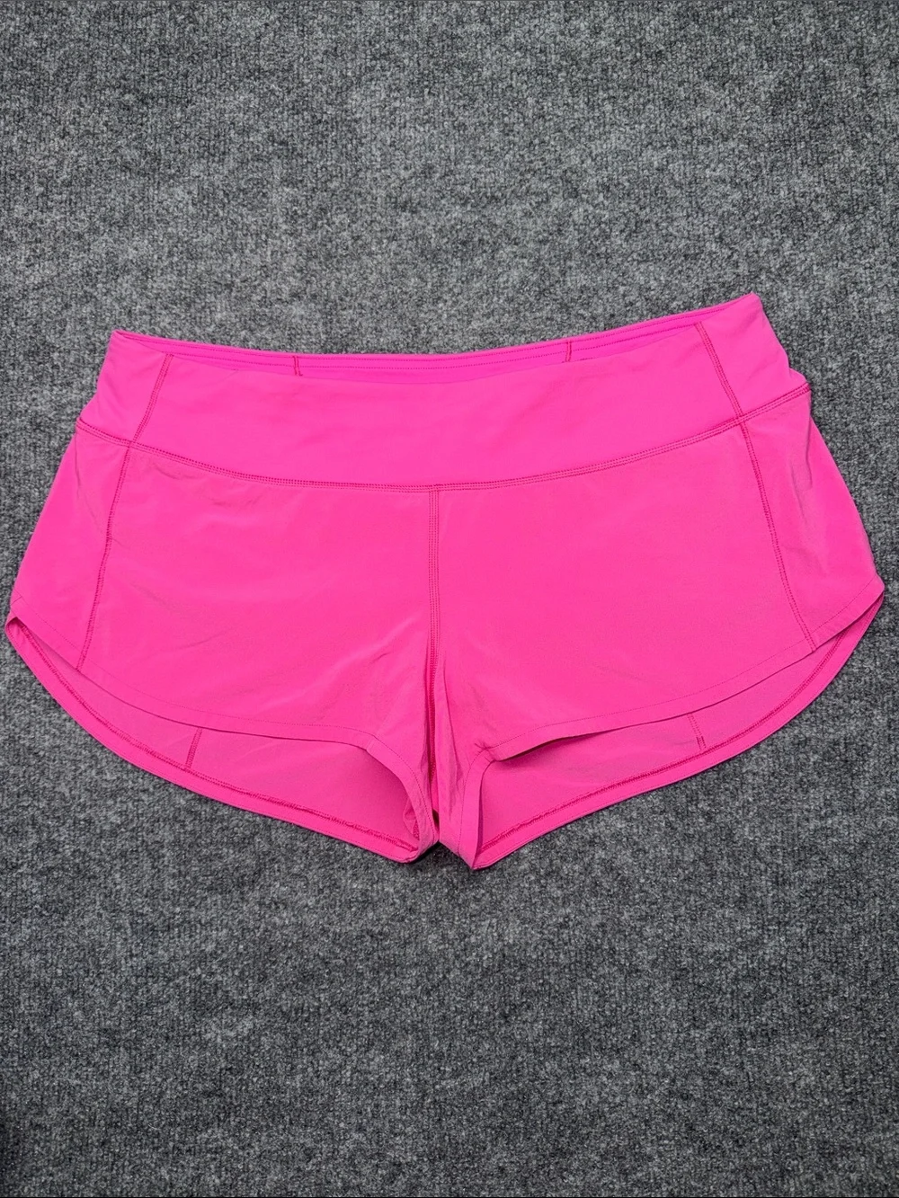 Lululemon Speed Up Shorts in the bright Sonic Pink colorway